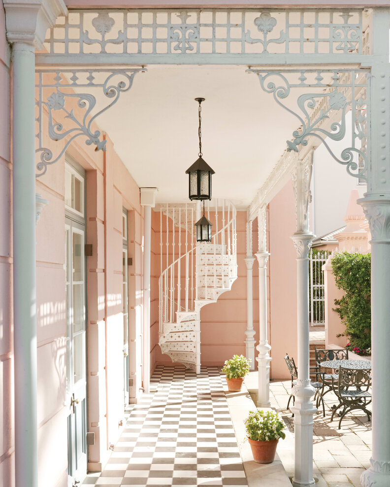 A pink and white hallway at the Mount Nelson hotel.