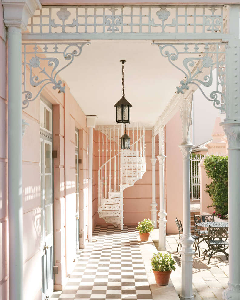 A pink and white hallway at the Mount Nelson hotel. 