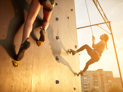 A person rock climbing.