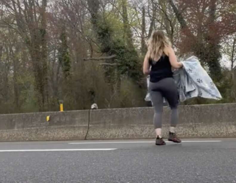 woman running to get possum