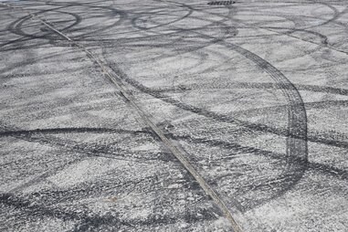 tire skid marks from drivers doing donuts