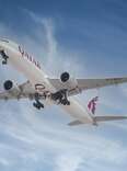 Qatar Airways plane mid-flight