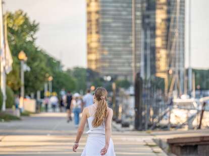 woman walking along Chicago's lakefront trail