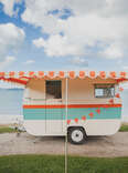 A retro looking Wes Anderson inspired aluminum camper in New Zealand