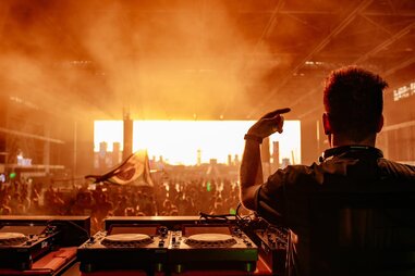 looking out at a crowd from the perspective of a Disc Jockey