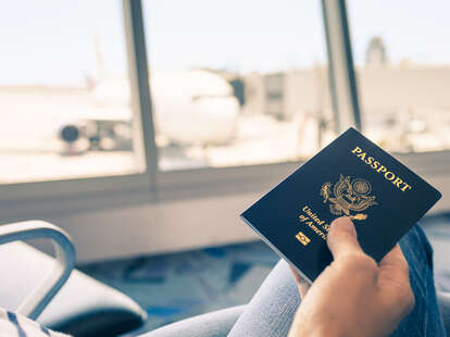 person holding passport