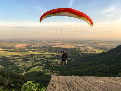 An extreme paraglider in action in Brazil