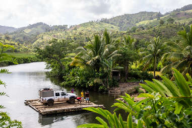 truck on jungle river