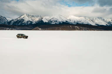 car over frozen russian lake