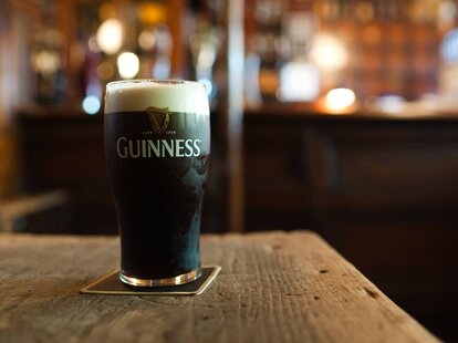 Guinness in a branded glass
