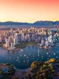 Beautiful aerial view of downtown Vancouver skyline, British Columbia, Canada at sunset.