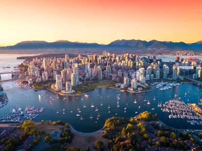 Beautiful aerial view of downtown Vancouver skyline, British Columbia, Canada at sunset.