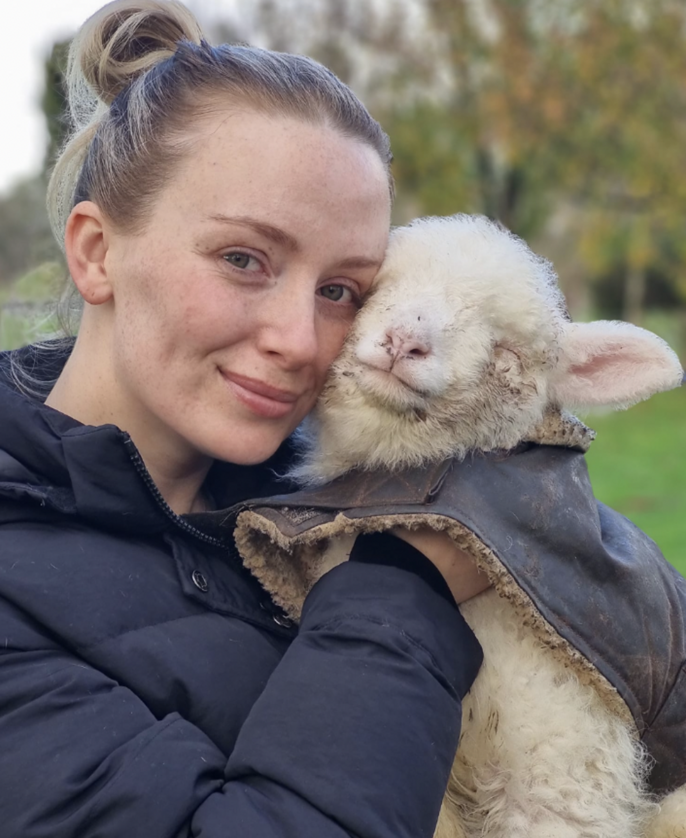 Orphaned Lamb Reunites With Rescuer And Immediately Melts In Her Arms