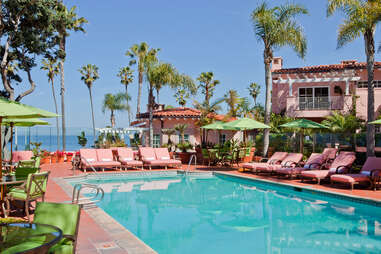 An aerial view of the coral pink, oceanfront hotel La Valencia. 