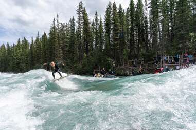 river surfers