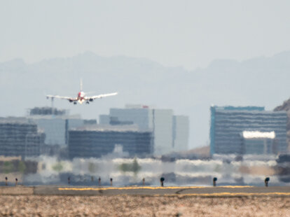 An airplane approaches the runway at the Phoenix Sky Harbor International Airport during a heat wave on July 15, 2023.
