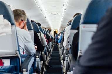 passengers sitting on a plane