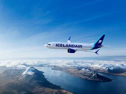 icelandair plane flying over iceland