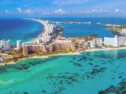 Aerial panoramic view of the northern peninsula of the Hotel Zone (Zona Hotelera) in Cancún, Mexico.