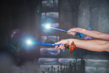 wands being waved during MagiQuest game