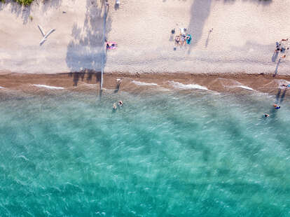 aerial view of people enjoying beach on lake huron 
