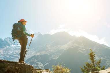 Female backpacker on mountain top