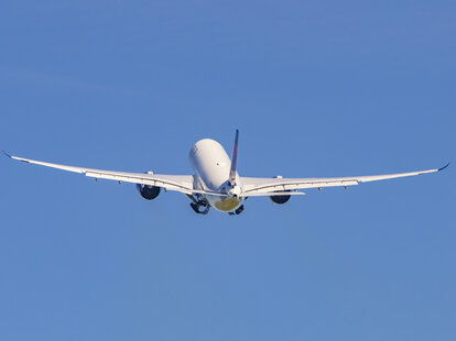 Delta Air Lines Airbus A330neo or A330-900 aircraft with neo engine option of the European plane manufacturer, as seen departing from Amsterdam Schiphol AMS EHAM International airport from Polderbaan runway and flying in the blue sky.