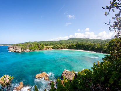 Views of the coastline and bays with turquoise water from the cliffs in Jamaica Portland.