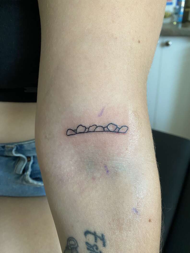 dog teeth tattoo