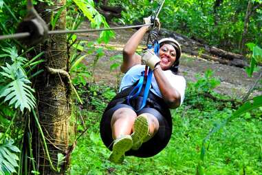 Woman ziplining