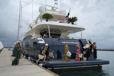 the cast of real housewives ultimate girls trip boarding a yacht in thailand