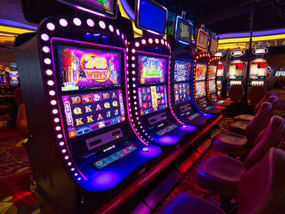 Casino machines in the entertainment area at night in Las Vegas, Nevada.
