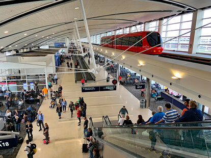 The busy passenger terminal at the airport in Detroit.