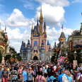 Crowds fill Main Street USA in front of Cinderella Castle at the Magic Kingdom on the 50th anniversary of Walt Disney World, in Lake Buena Vista, Florida, on Oct. 1, 2021. 