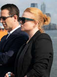 Jeremy Strong and Sarah Snook standing in NYC on the set of HBO' Succesion.