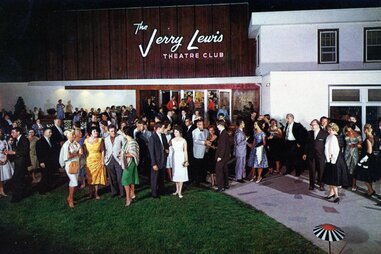People standing outside of a nightclub