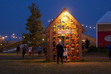 richardson farm pumpkin display at night