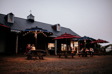 picnic tables at farm at dusk