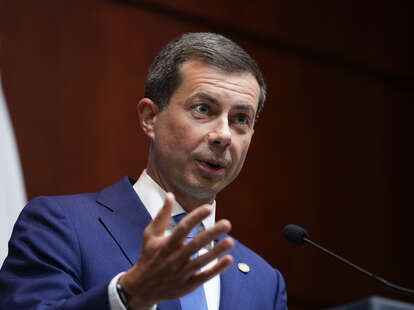 Transportation Secretary Pete Buttigieg speaks during a news conference at the U.S. Department of Transportation headquarters
