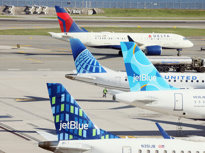 Airplanes from Delta, United and JetBlue populate the taxiway at Laguardia AIrport in the Queens borough of New York City.