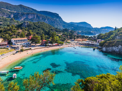 Picturesque village of Paleokastritsa and its beach in Corfu, Greece