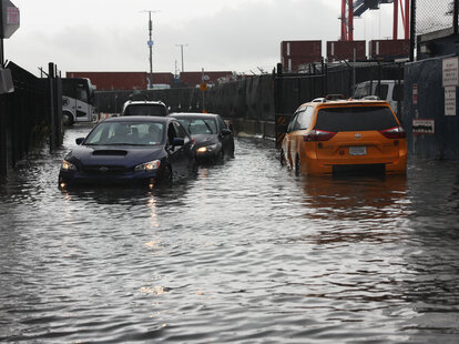 Cars sit stuck in the flooded streets in the Red Hook neighborhood on September 29, 2023 in the Brooklyn borough of New York City.