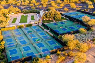 aerial view of pickleball court surrounded by desert