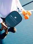 pickleball court with paddle