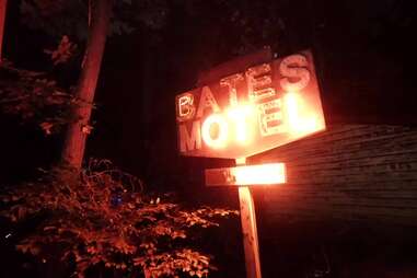 "bates motel" sign lit up with red light