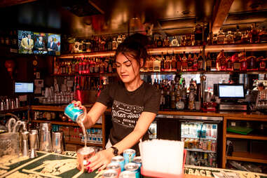 Bartender pours a beer during the Urban Ale Trail event in Phoenix