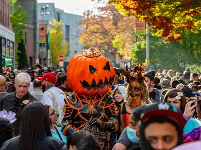 pumpkin head in halloween parade