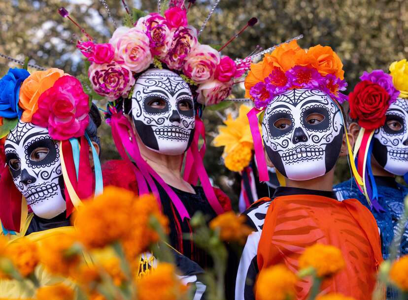 four women wearing skull masks at dia de los muertos celebration san antonio texas