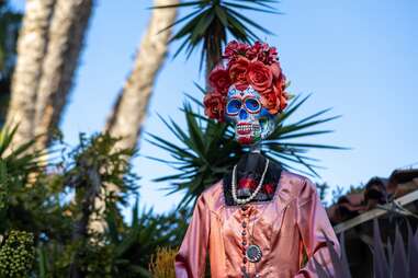 skeleton sculpture at dia de los muertos celebration in old town san diego, california