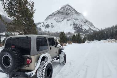 Off-road vehicle in the snow in Kirwin, Wyoming